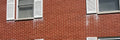 How to Remove Titanium Dioxide Paint Stains From Brick & Masonry